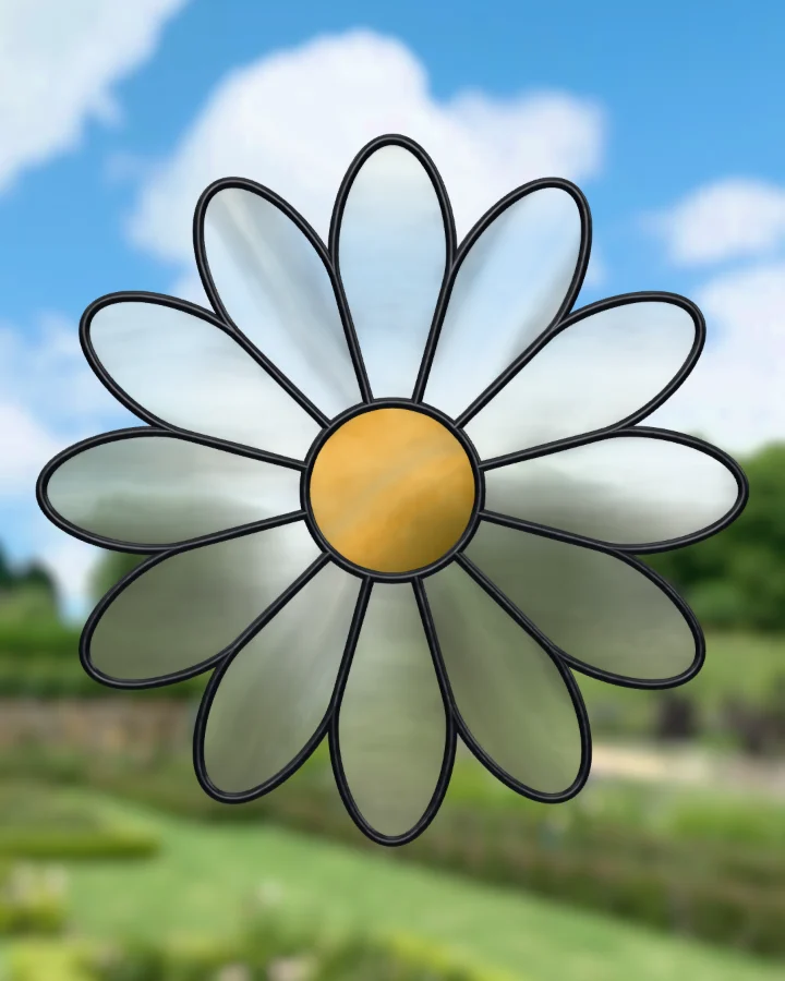 Daisy suncatcher glazed, lit from behind.