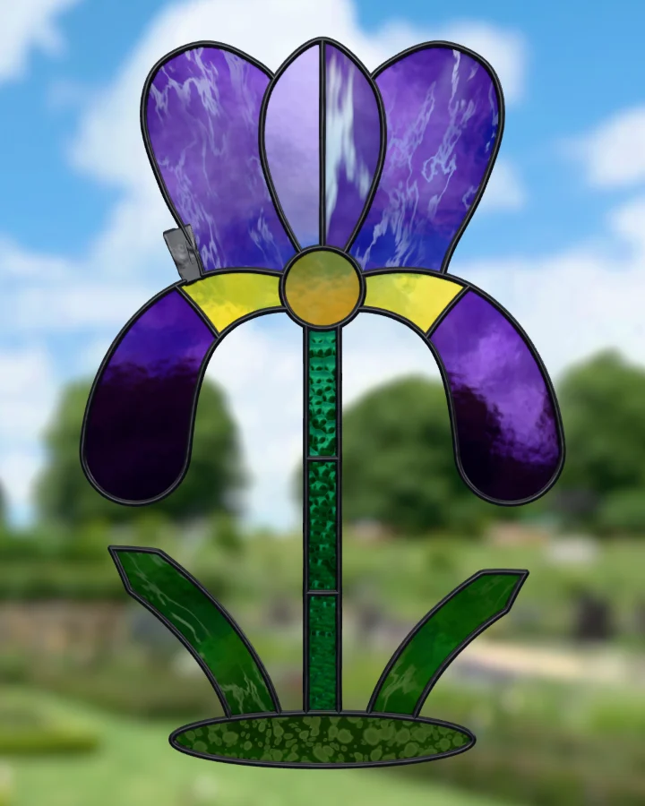 Iris suncatcher glazed, lit from behind.