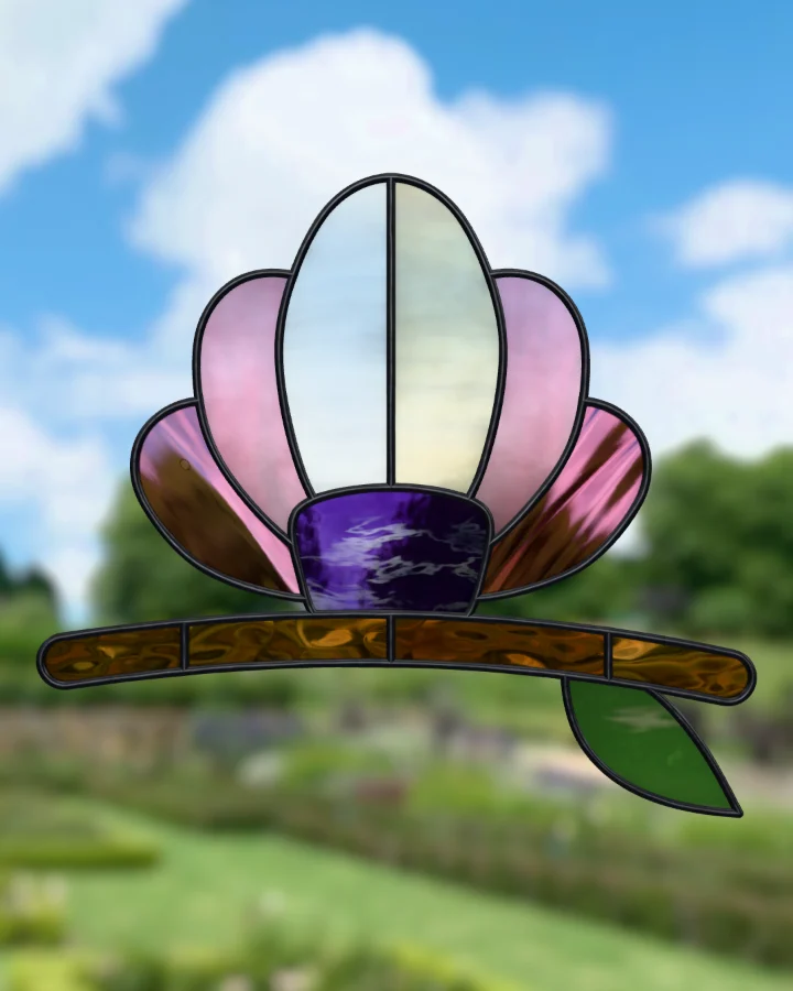 Magnolia suncatcher glazed, lit from behind.