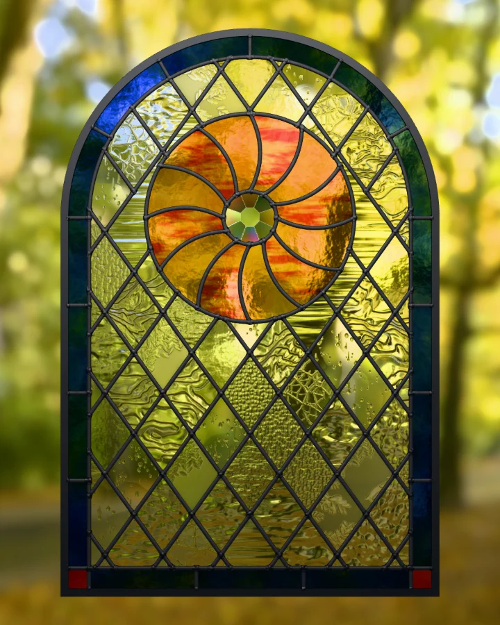 Sunwheel window in its Cobalt and amber colourway, lit from behind.