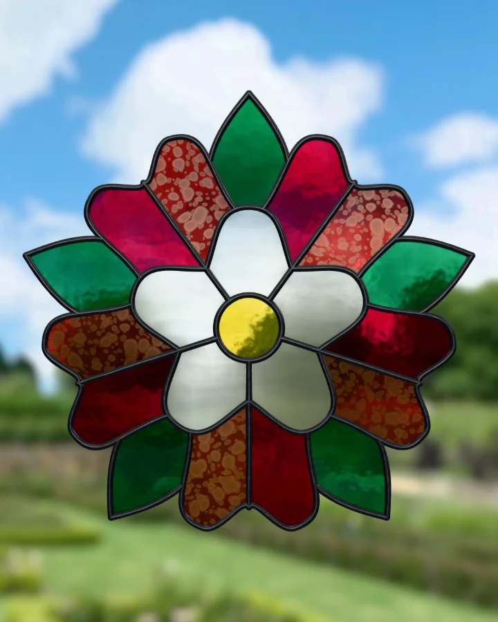 Tudor rose suncatcher glazed, lit from behind.